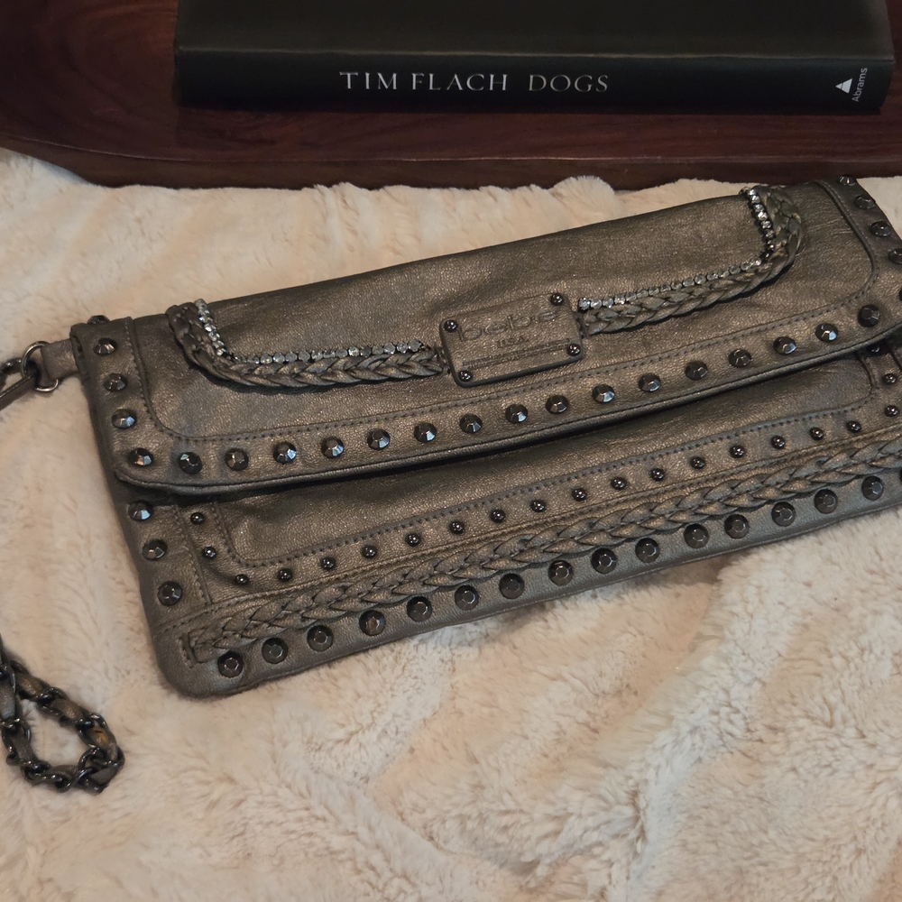 BEBE Studded Metallic Clutch in gunmetal